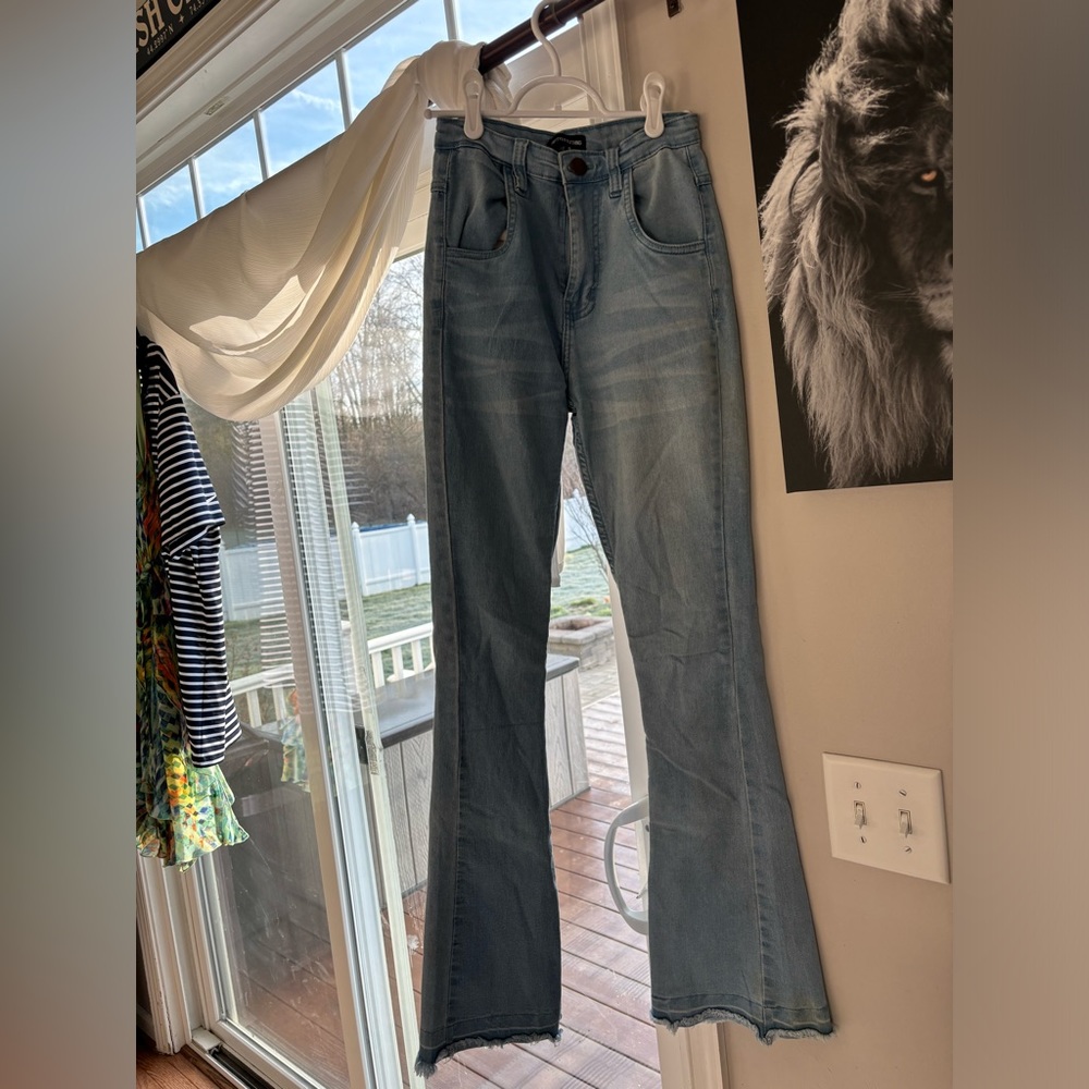 Pretty Little Thing boot cut jeans.